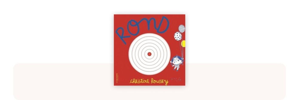 Rond de Christine Roussey, livre cartonné rouge aux découpes en forme de cercles, apprécié comme un des meilleurs livres bébé 0-12 mois pour explorer formes et motricité